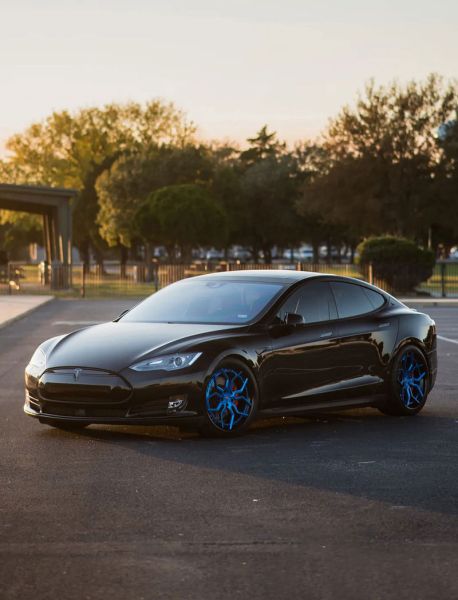 EVS Black Tesla In Parking Lot