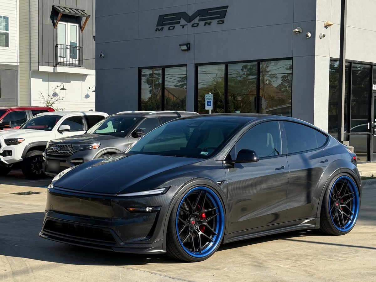 Lowered Tesla Model Y on forged wheels at EVS Motors in Houston
