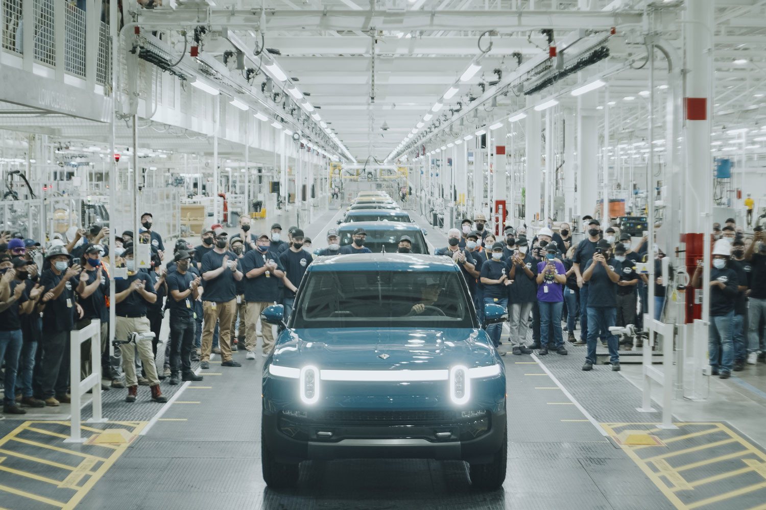 Blue Rivian in Garage